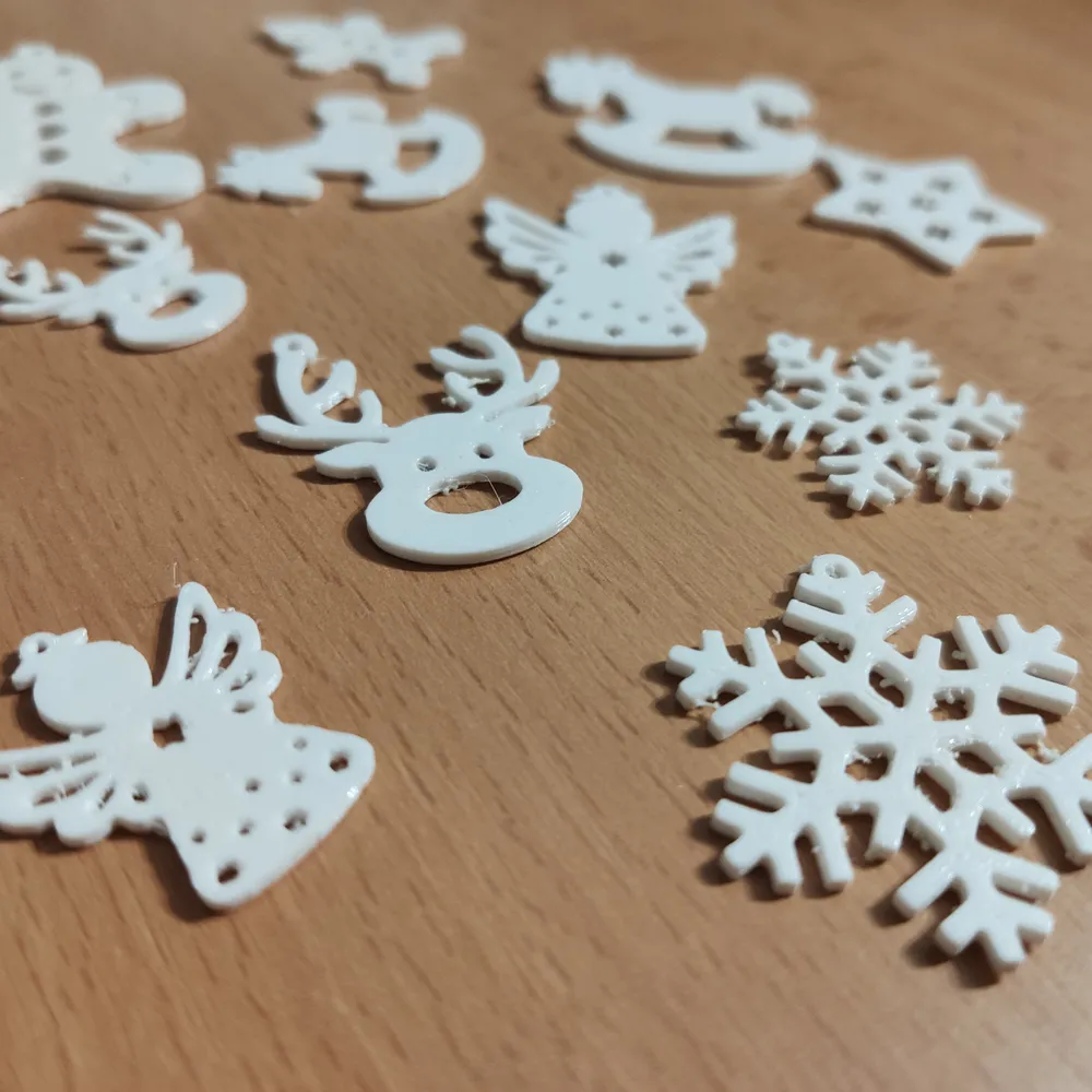 Flocos de neve, anjos e renas brancos impressos